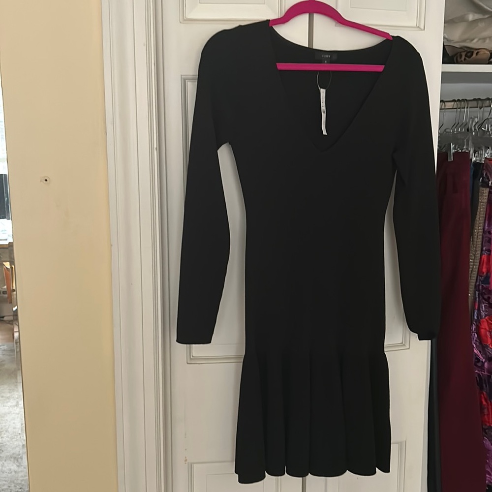 New with tags JCrew  black long sleeve dress. Very cute on. Too big.